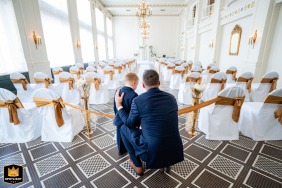 At The Washington Hotel in Washington, PA, Sam's son shares a special moment with his soon-to-be stepfather before the wedding ceremony begins.